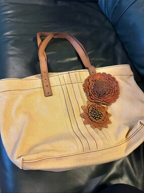 Fossil Beige Canvas Tote with Brown Leather Handles and Floral Leather Appliqué